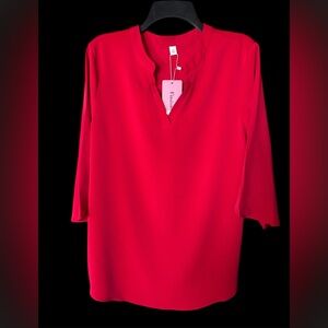 Women's red blouse with wide, flowing sleeve ending in a structured hem NWT